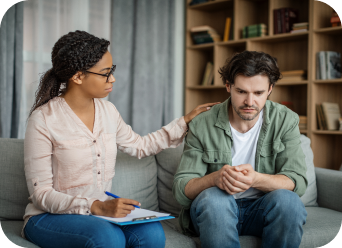 Therapist counseling a patient during a mental health session